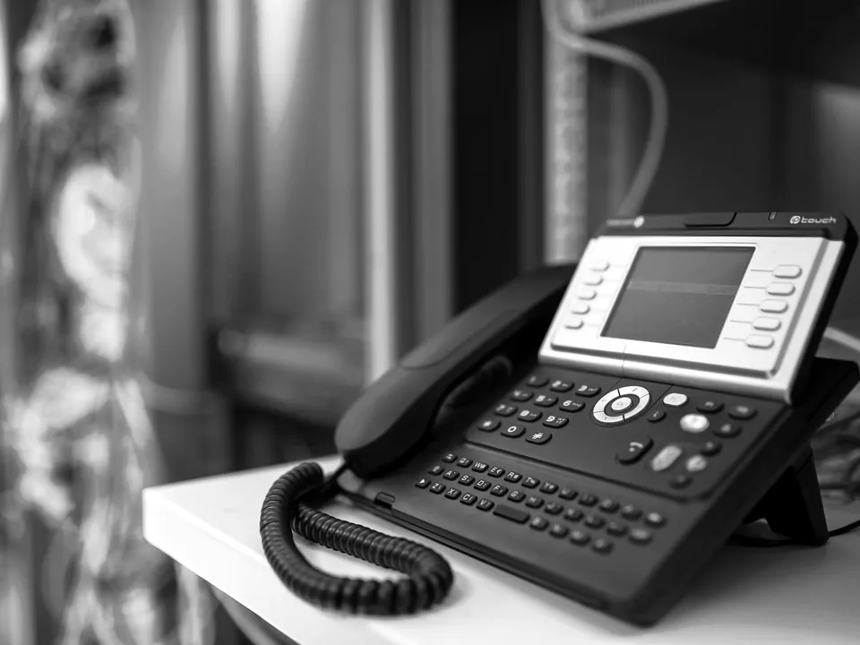 Business IP telephone and call routing headset